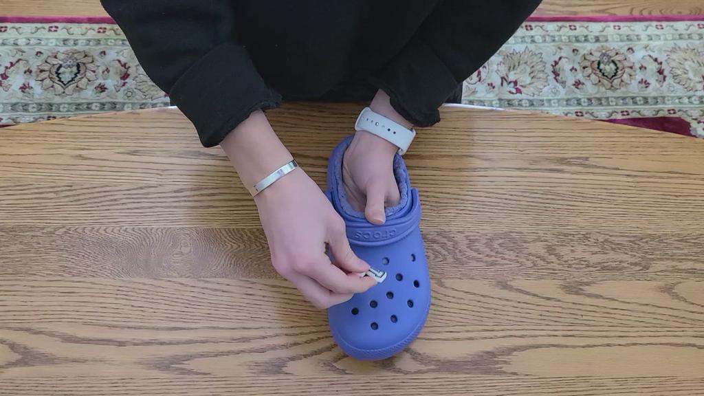 'Video thumbnail for How to place Jibbitz on your fuzzy Crocs'